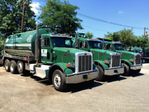 Russell Reid Waste Water Service Trucks