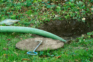septic system cleaning in a residential backyard